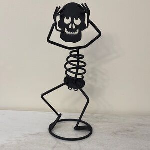 Whimsical Black Skeleton Metal tea light Sculpture